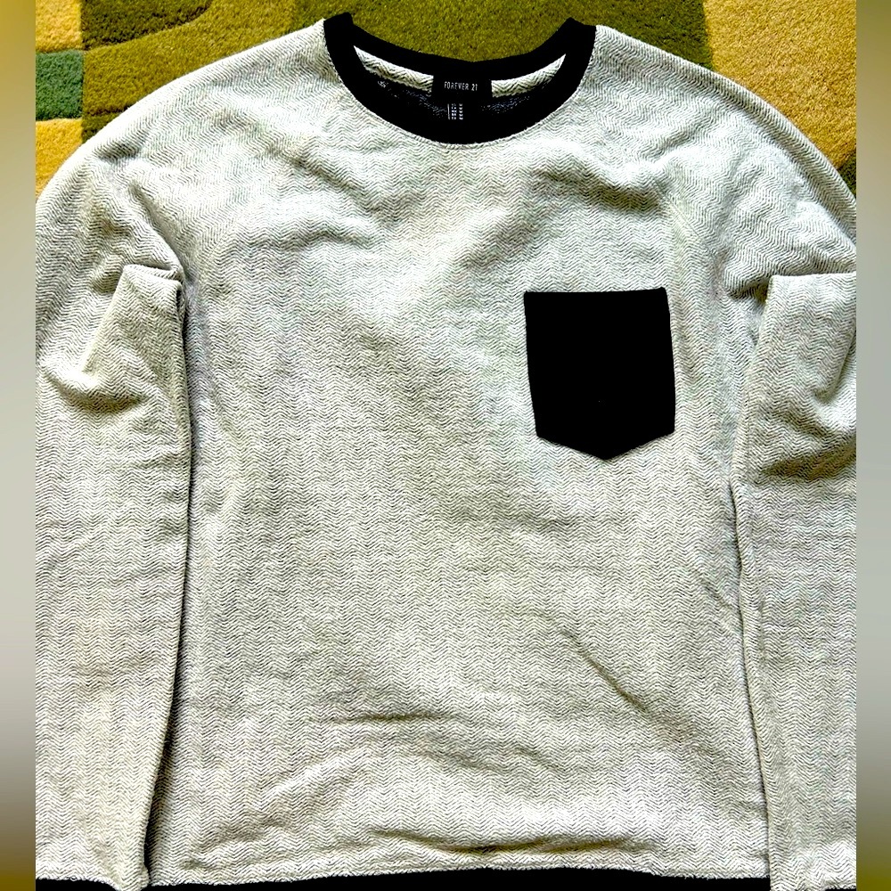 Forever 21 sweater medium snug Off white with blue collar and side pocket.